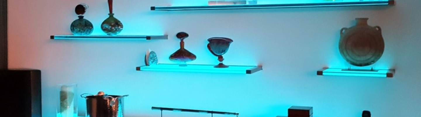 Blue lit glass shelves