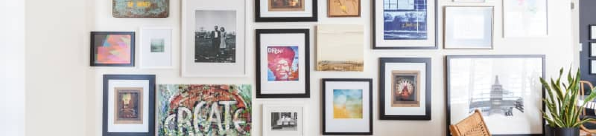 Pictures with varying frames on a wall