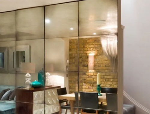 Home interior with rustic mirrors on wall