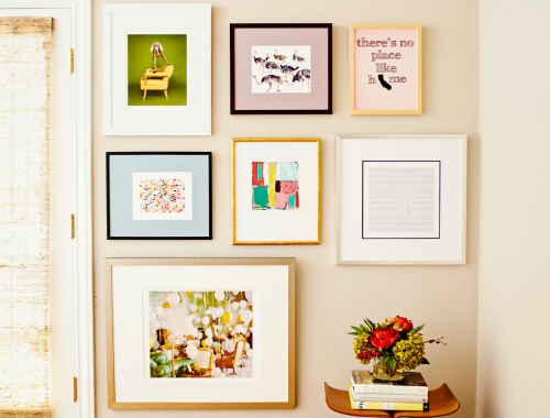 Picture frames on beige wall