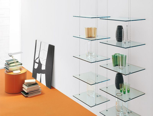 glass shelves holding items and decoration